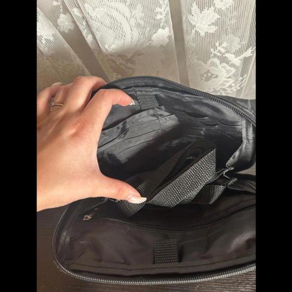 Durable Black Nylon Multi-Function Pouch with Zipper and D-Ring Attachments